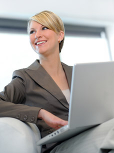 Excluded Income - Image of Business Woman and computer